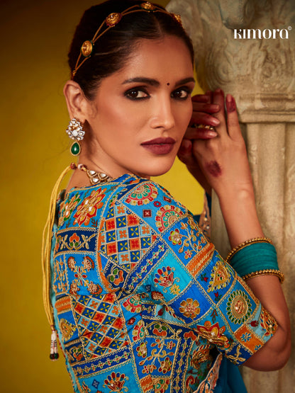 Dhiyona KM Women Regal Blue Saree With Intricately Embroidered Blouse