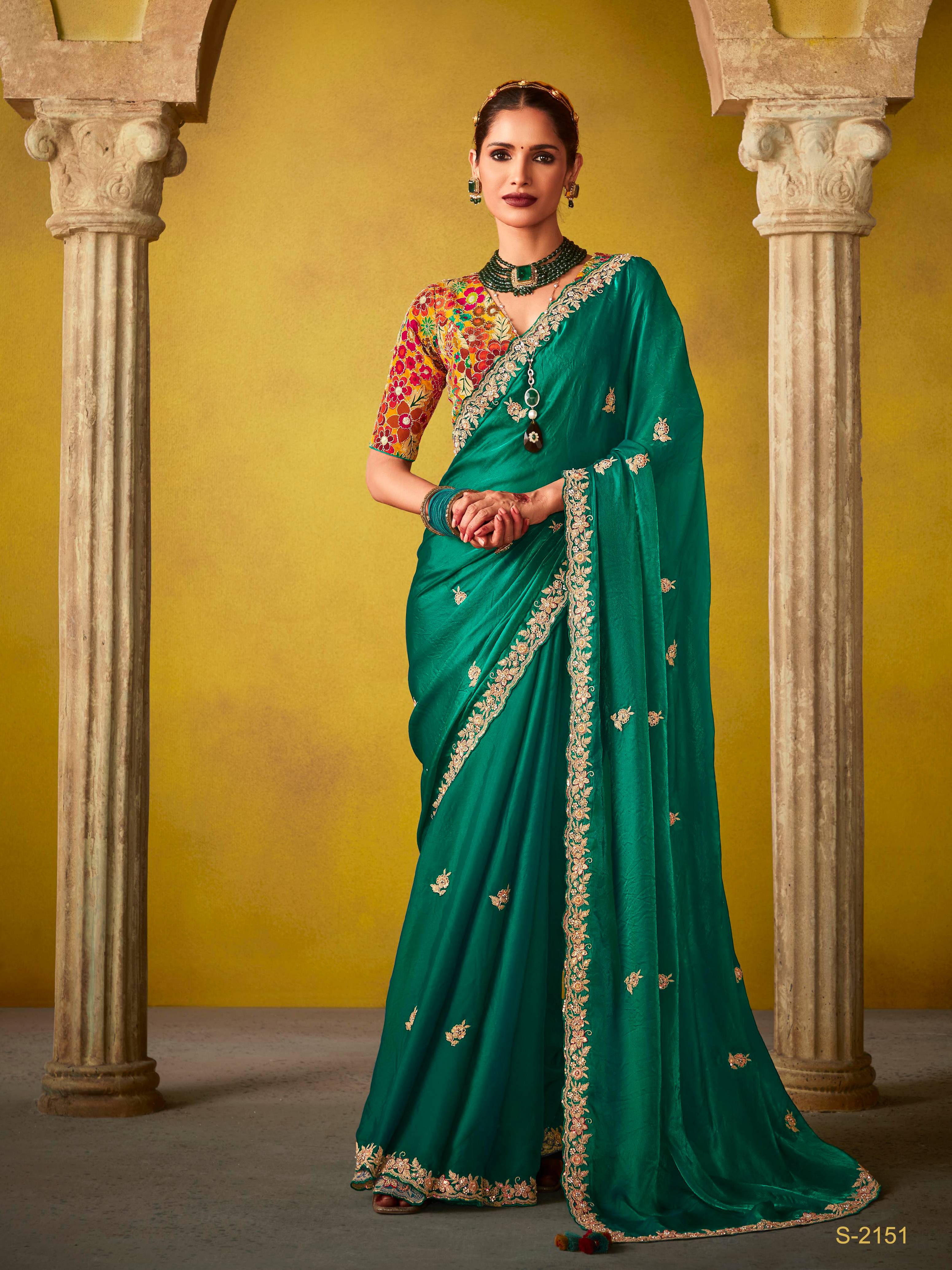 Dhiyona KM Women Emerald Green Saree With A Vibrant Floral Embroidered Blouse