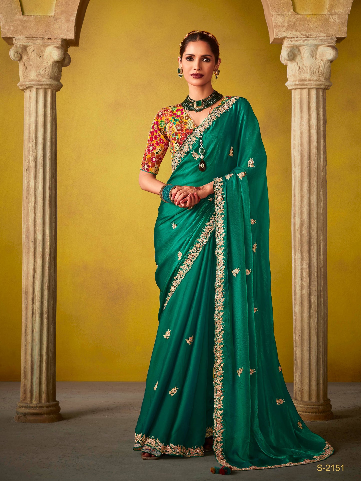 Dhiyona KM Women Emerald Green Saree With A Vibrant Floral Embroidered Blouse