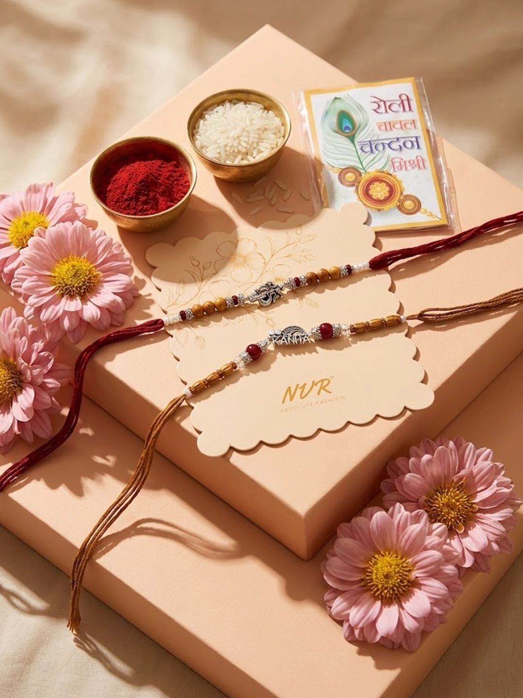 Dhiyona Set Of 2 Silver Toned Religious Rakhi Thread Rakhi Roli Chawal Chandan Mishri