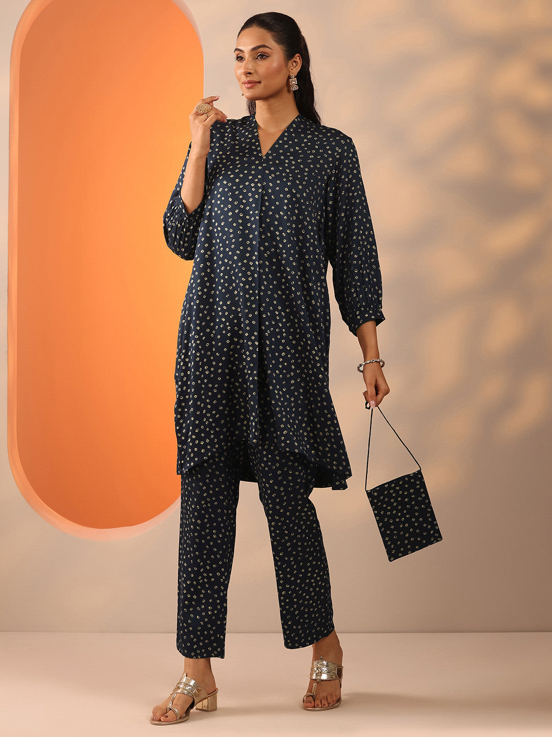 Bandhani Printed Pleated V-Neck A-Line Kurta With Trouser & Potli