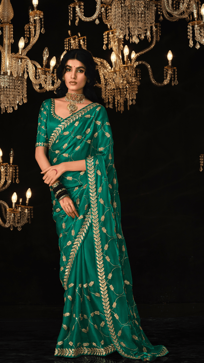 Dhiyona KM Women Grace In Gold “ Green Silk Saree