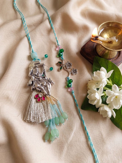 Dhiyona Set Of 2 Designer Religious Silver Toned Bhaiya Bhabhi Rakhi