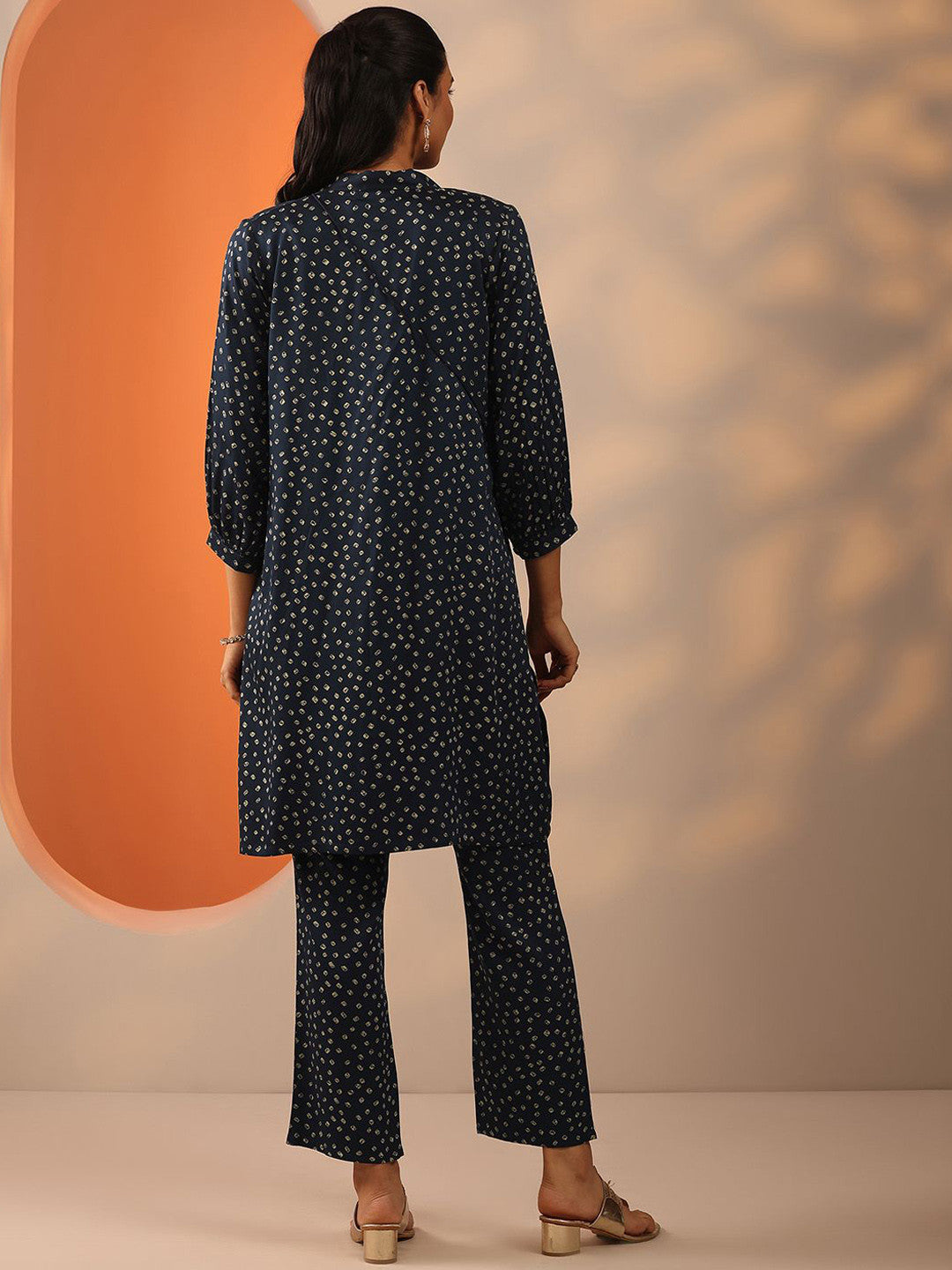 Bandhani Printed Pleated V-Neck A-Line Kurta With Trouser & Potli