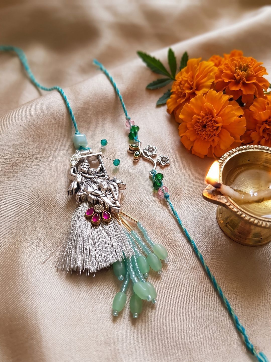 Dhiyona Set Of 2 Designer Religious Silver Toned Bhaiya Bhabhi Rakhi