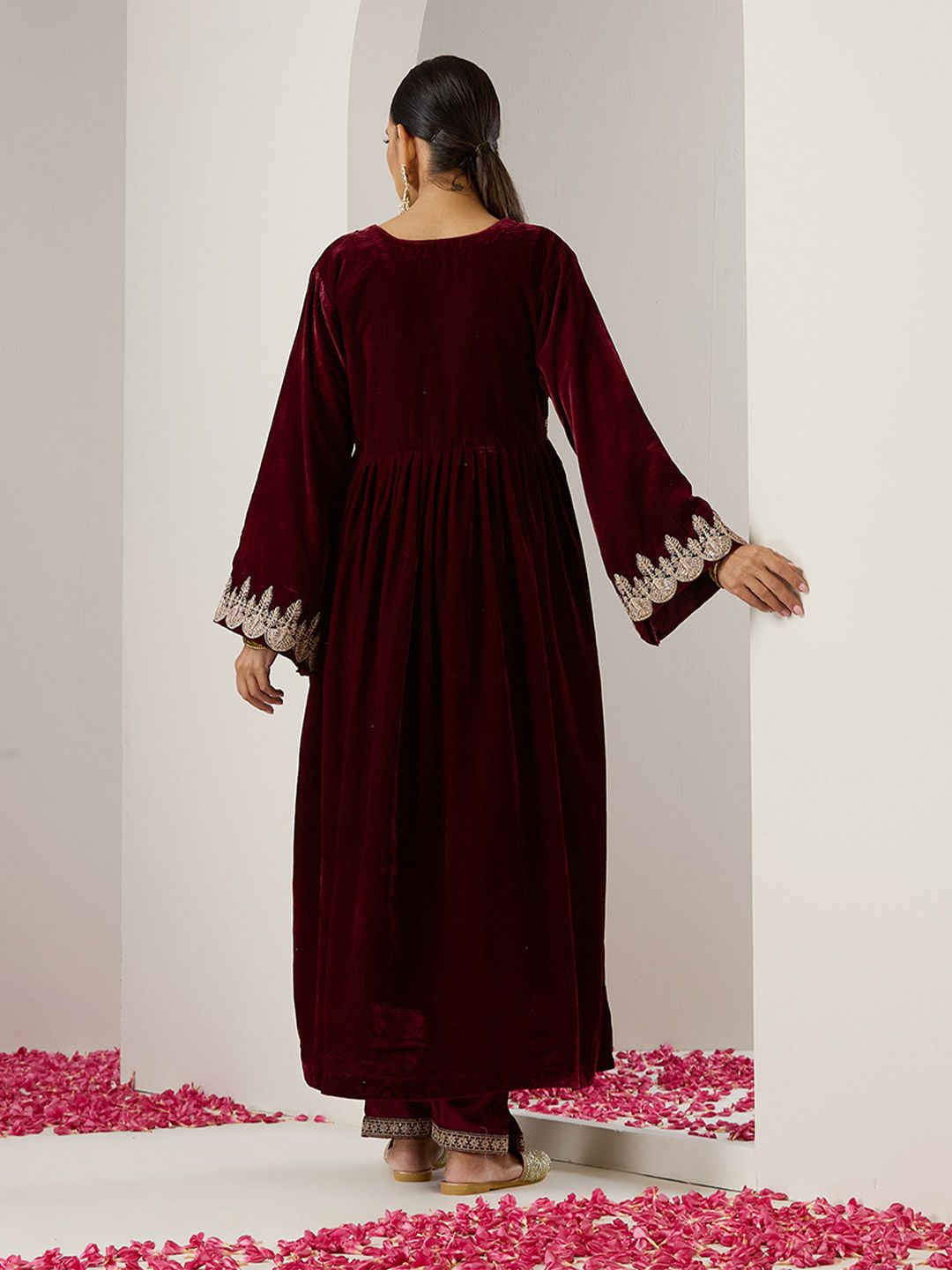 Dhiyona IS Women's Purple Ethnic Motifs Embroidered Flared Sleeves Velvet A-Line Kurta With Trousers