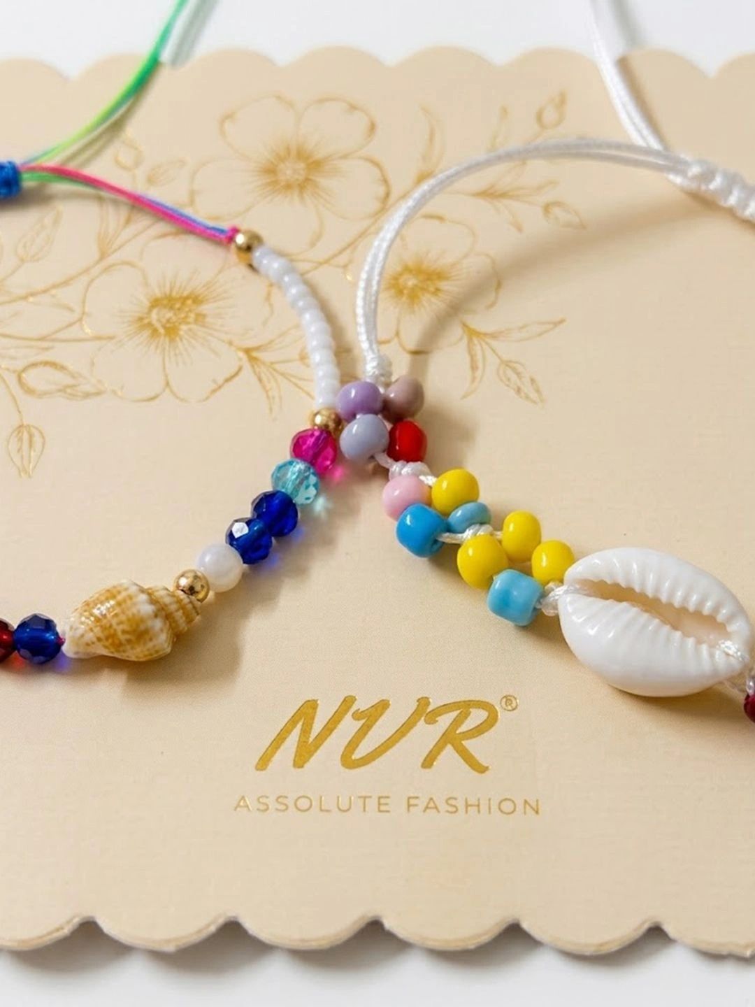 Dhiyona Set Of 2 Artificial Beads Thread Rakhi With Roli Chawal Chandan Mishri