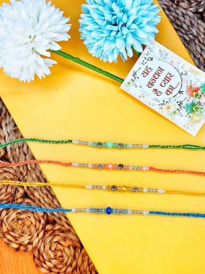 Dhiyona Set Of 4 Multicolor Artificial Beads Thread Rakhi With Roli Chawal Chandan Mishri