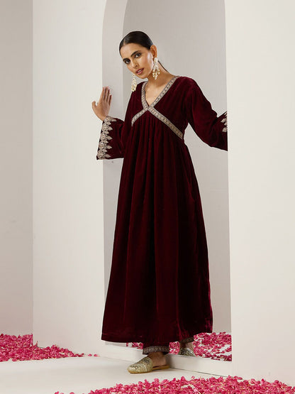 Dhiyona IS Women's Purple Ethnic Motifs Embroidered Flared Sleeves Velvet A-Line Kurta With Trousers