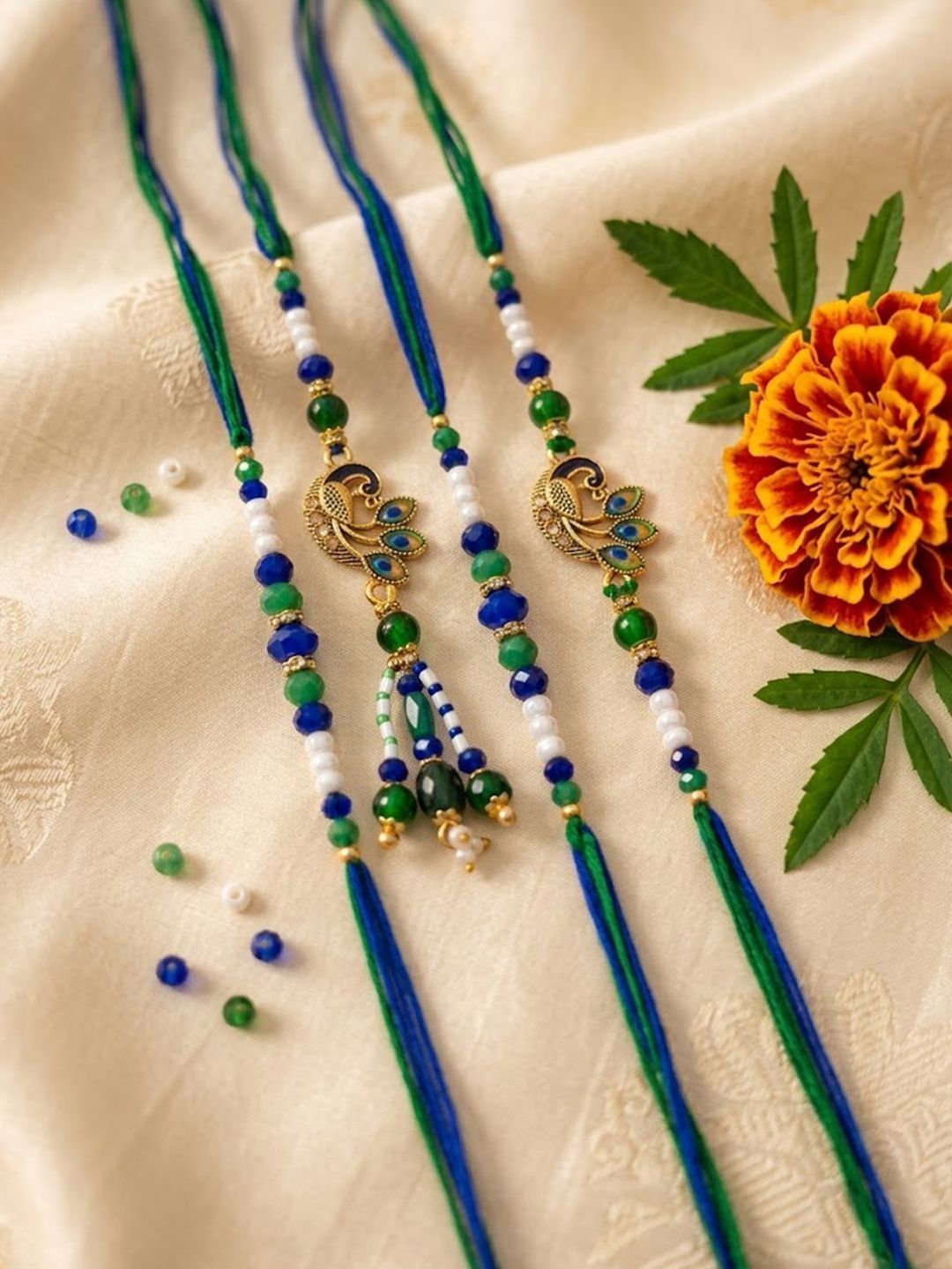 Dhiyona Set Of 4 Green Peacock Design Artificial Beads Thread Rakhi With Roli Chawal