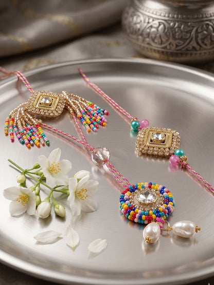 Dhiyona Set Of 2 White Artificial Stones Golden Toned Bhaiya Bhabhi Rakhi With Roli Chawal