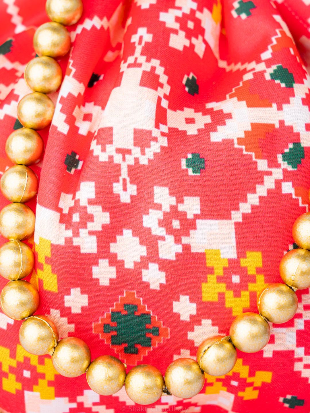 Dhiyona NR Embroidered Embellished Potli Clutch