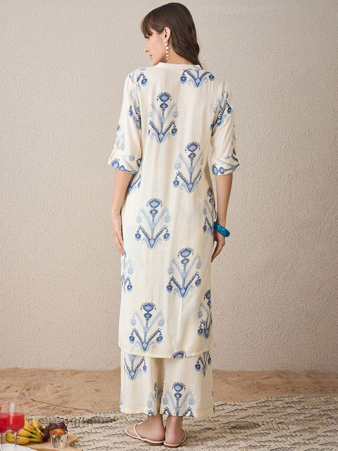 Women Printed Regular Kurta with Trousers