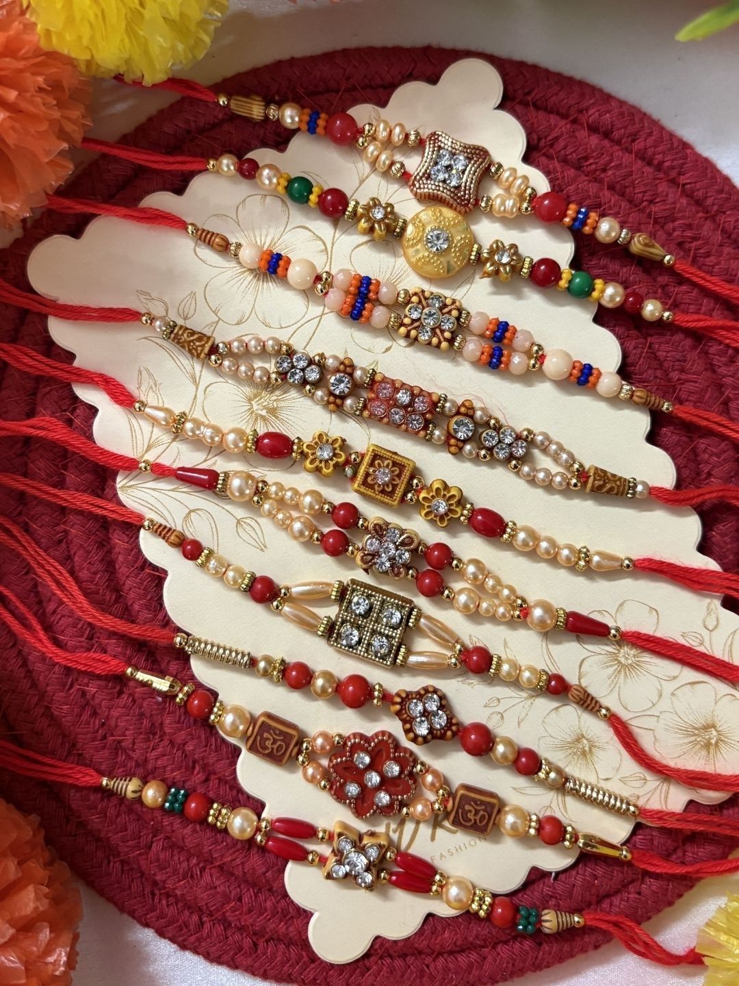 Dhiyona Set Of 10 Artificial Stones & Beads Thread Rakhi With Roli Chawal Chandan Mishri