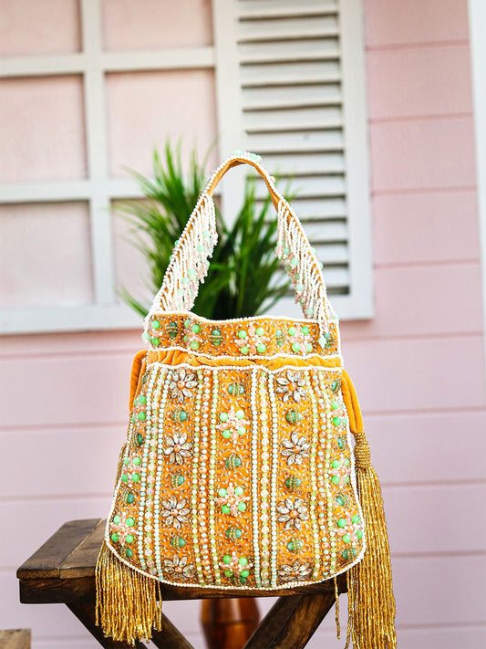 Dhiyona NR Women Gold-Toned & Green Embroidered Tasselled Potli Clutch