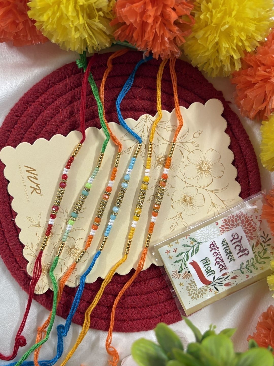 Dhiyona Set Of 6 Multi Artificial Beads Thread Rakhi With Roli Chawal Chandan Mishri