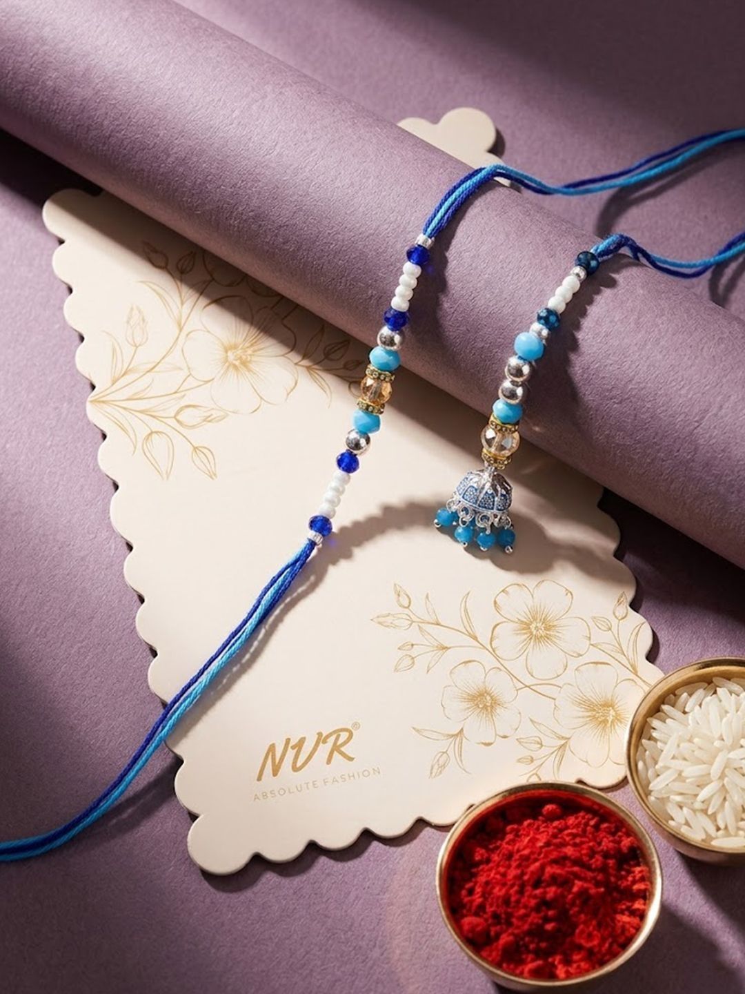 Dhiyona Set Of 2 Blue Artificial Beads Jhumka Design Bhaiya Bhabhi Rakhi With Roli Chawal