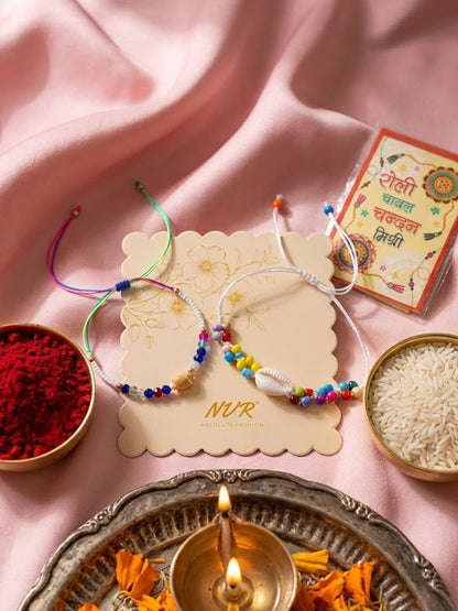 Dhiyona Set Of 2 Artificial Beads Thread Rakhi With Roli Chawal Chandan Mishri