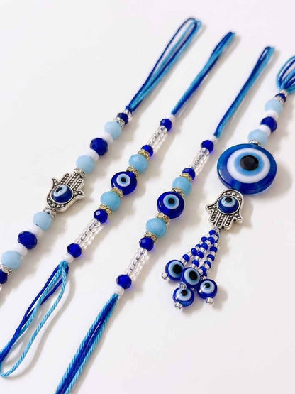 Dhiyona Set Of 4 Designer Blue Evil Eye Thread Rakhi With Roli Chawal Chandan Mishri