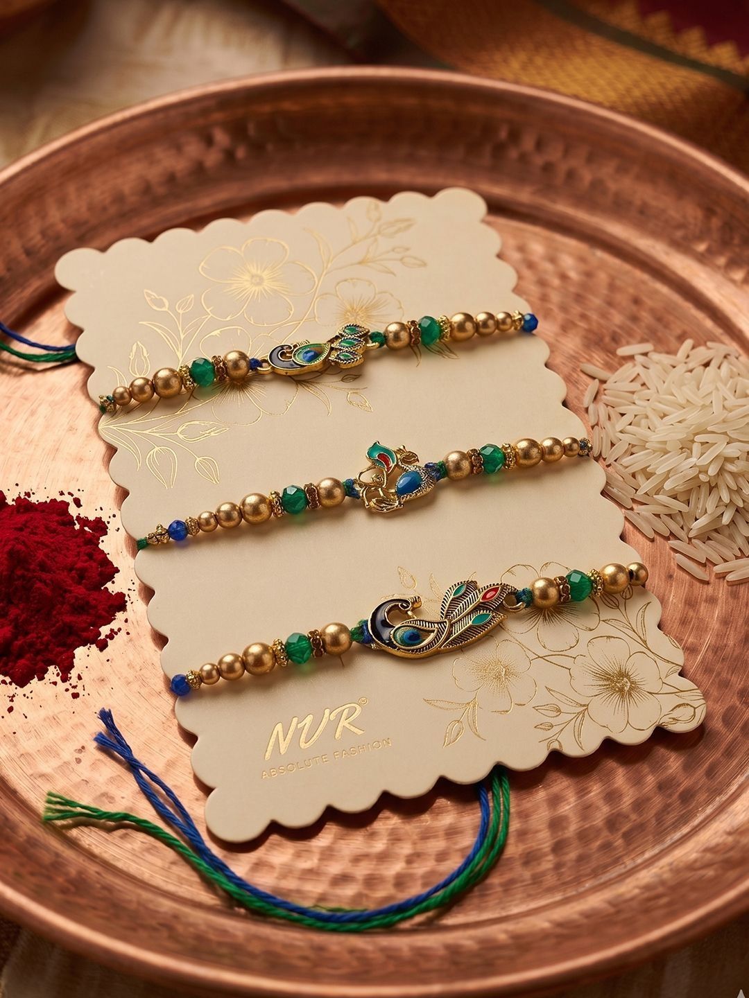 Dhiyona Set Of 3 Peacock Design Multicolor Artificial Beads Thread Rakhi With Roli Chawal