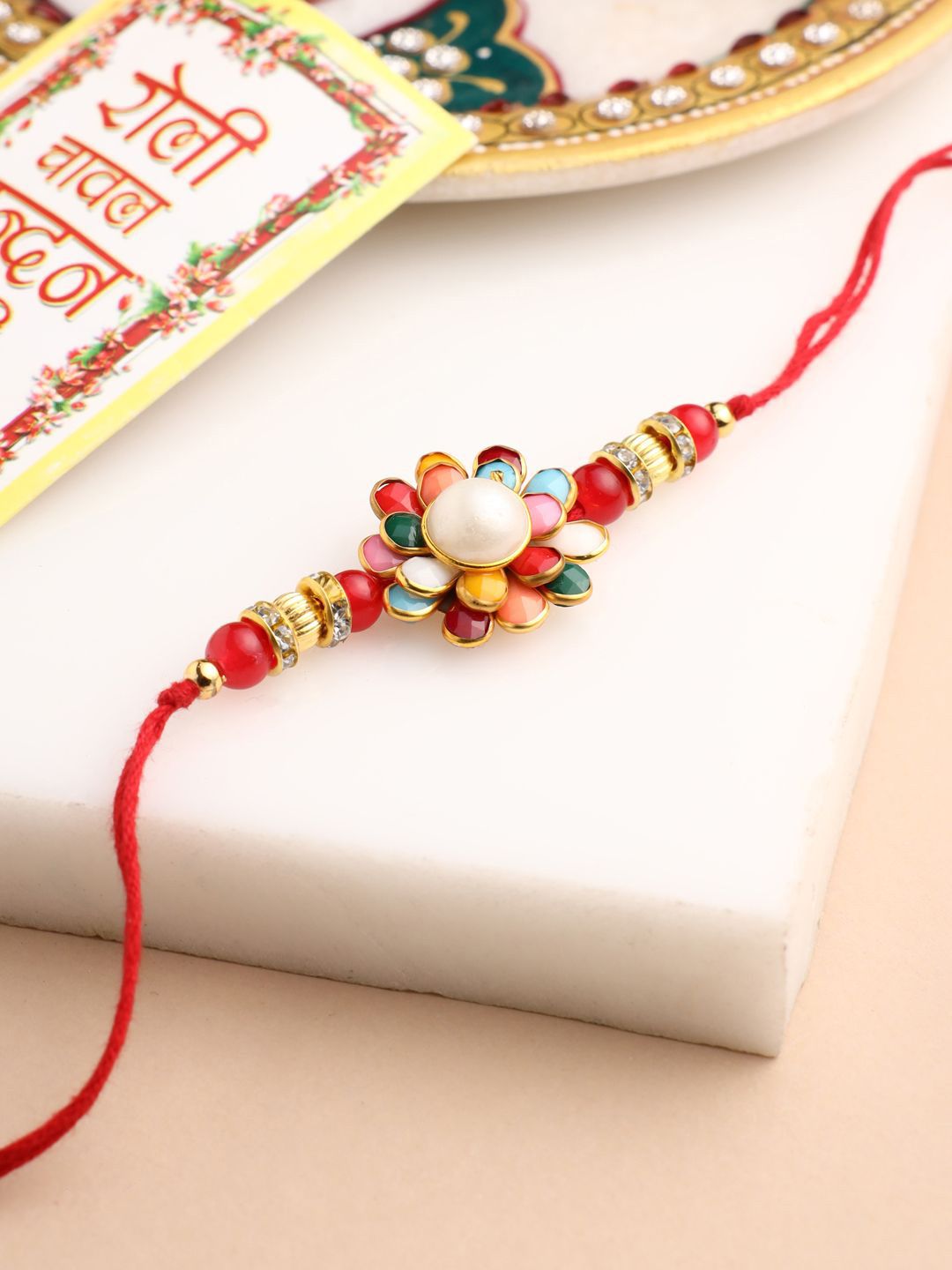 Dhiyona Men Multicolor Beads & Pearls Floral Design Thread Rakhi For Rakshabandhan