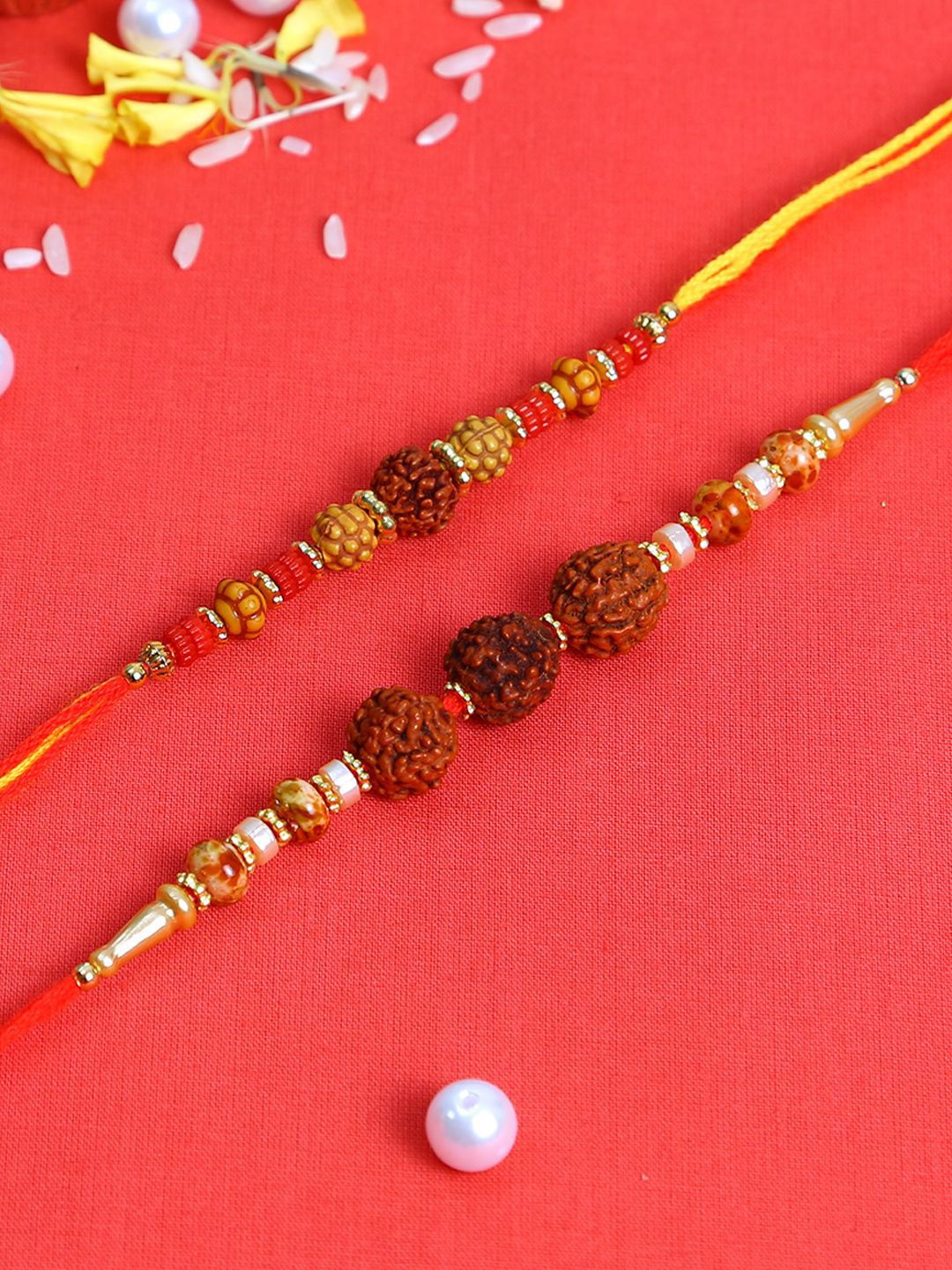 Dhiyona Set Of 2 Brown Rudaraksh-Beaded Rakhi With Roli Rice & Greeting Card