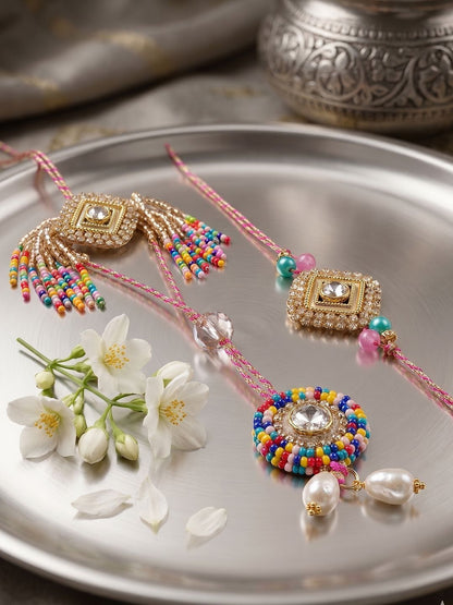 Dhiyona Set Of 2 White Artificial Stones Golden Toned Bhaiya Bhabhi Rakhi With Roli Chawal