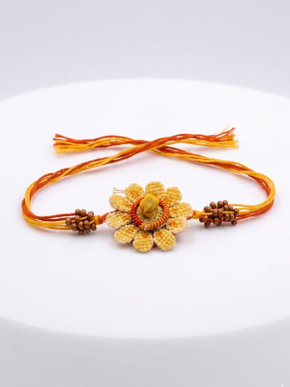Dhiyona Yellow Floral Seed Thread Rakhi With Roli Chawal Chandan Mishri