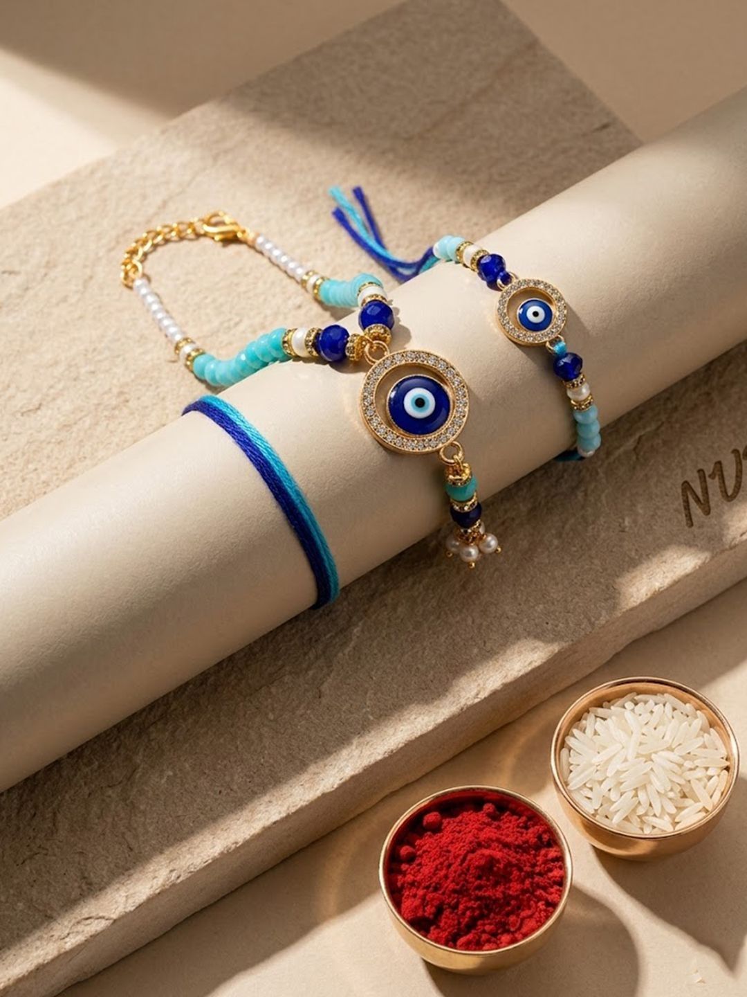Dhiyona Set Of 2 Blue Evil Eye Gold Toned Beaded Bhaiya Bhabhi Rakhi
