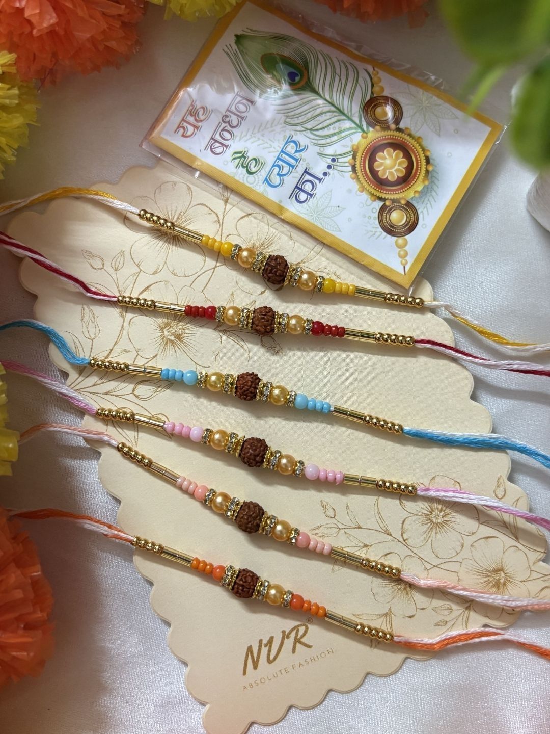 Dhiyona Set Of 6 Rudraksh & Artificial Beads Thread Rakhi With Roli Chawal Chandan Mishri