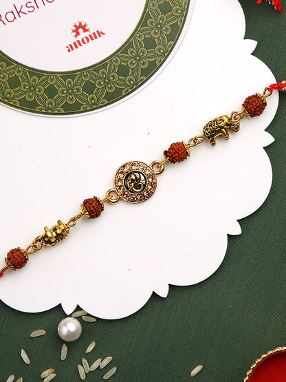 Dhiyona Stones Studded & Rudhraksh Beaded Rakhi With Roli Chawal & Greeting Card