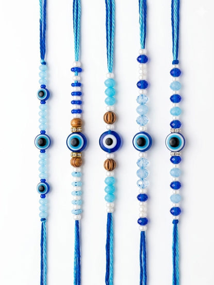 Dhiyona Set Of 5 Blue Evil Eye Thread Rakhi With Roli Chawal Chandan Mishri