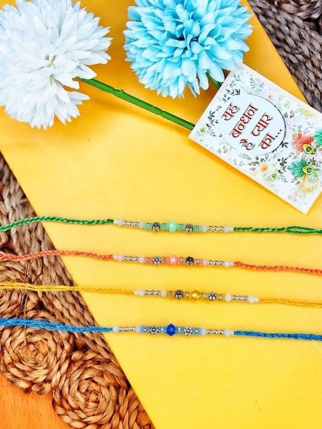 Dhiyona Set Of 4 Multicolor Artificial Beads Thread Rakhi With Roli Chawal Chandan Mishri