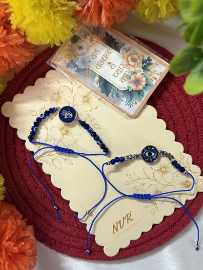 Dhiyona Set Of 2 Blue Evil Eye Thread Rakhi With Roli Chawal Chandan Mishri