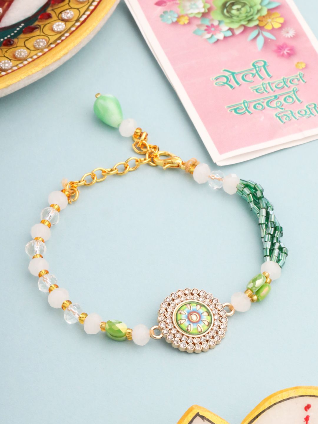 Dhiyona Artificial Stones & Beads Floral Wraparound Rakhi With Roli Chawal Chandan Mishri