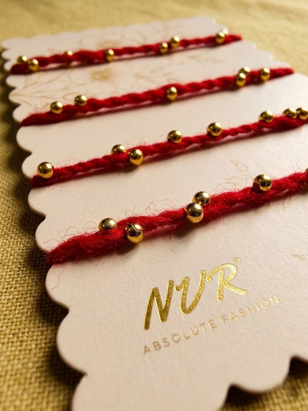 Dhiyona Set Of 4 Traditional Red Thread Rakhi With Roli Chawal Chandan Mishri