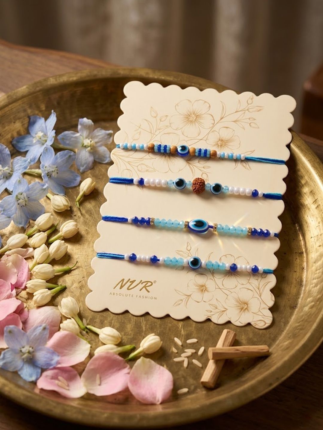 Dhiyona Set Of 4 Blue Evil Eye Thread Rakhi With Roli Chawal Chandan Mishri