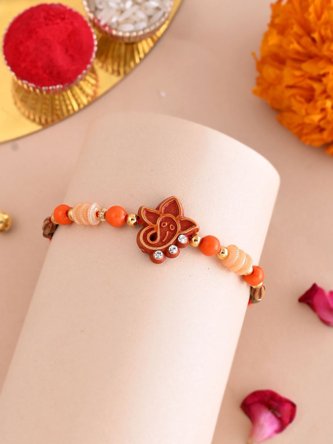 Dhiyona Cute Ganesha Face Beaded Thread Rakhi With Roli Chawal & Greetings Card