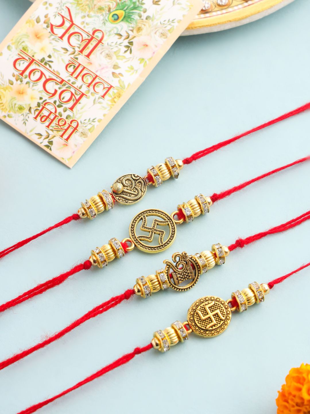 Dhiyona Men Set Of 4 Gold Toned Artificial Stones Swastik Design Thread Rakhi