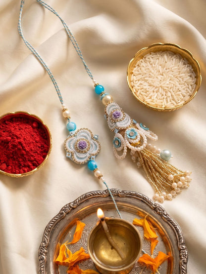 Dhiyona Set Of 2 Pearls & Artificial Stones Floral Bhaiya Bhabhi Rakhi With Roli Chawal