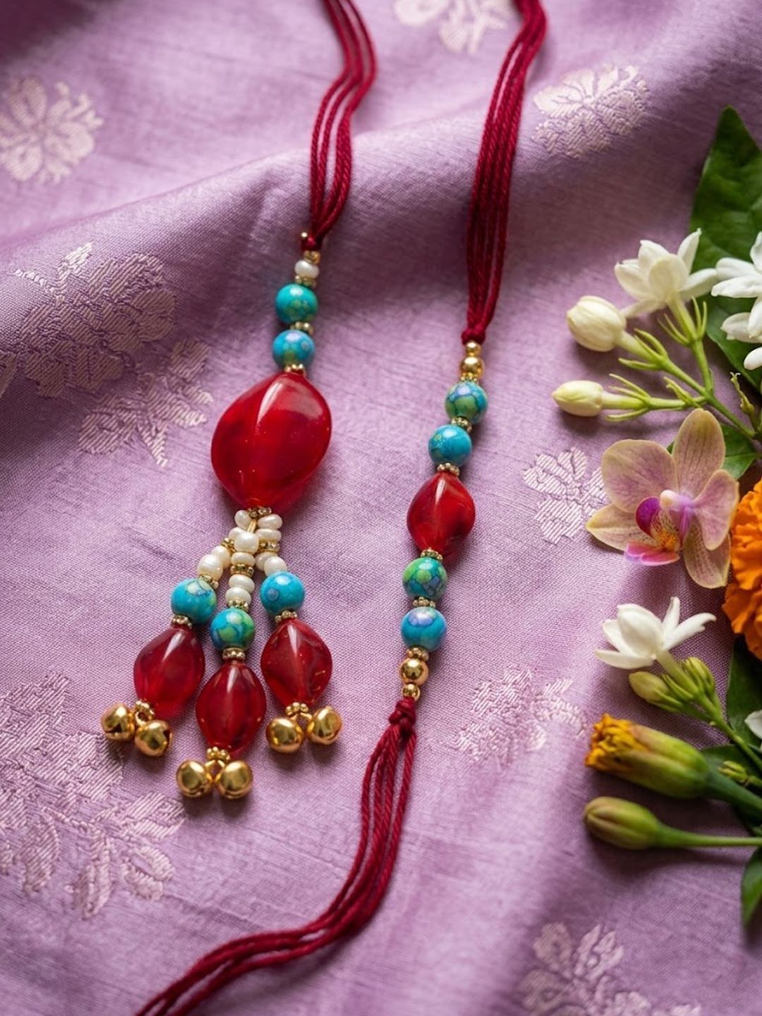 Dhiyona Set Of 2 Artificial Beads & Gold Toned Ghungroo Bhaiya Bhabhi Rakhi With Roli Chawal