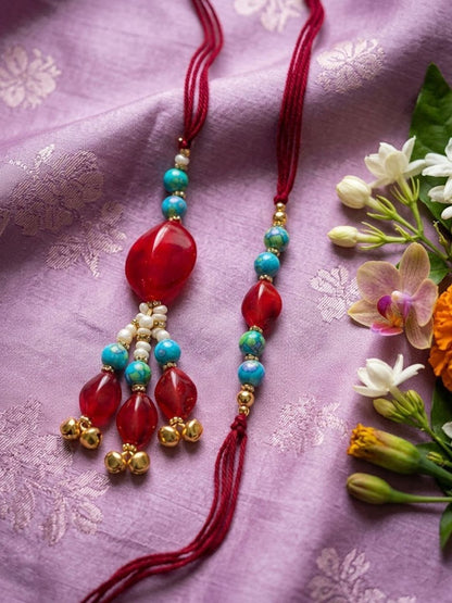 Dhiyona Set Of 2 Artificial Beads & Gold Toned Ghungroo Bhaiya Bhabhi Rakhi With Roli Chawal