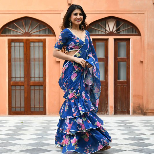Bunai Blue Floral Fusion Saree with intricate floral patterns and elegant drape, traditional Indian wear for special occasions.