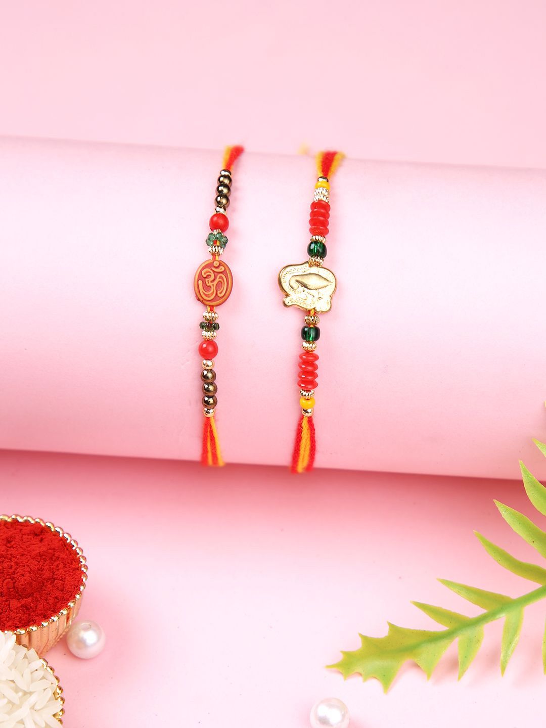 Dhiyona Set Of 2 Red Om & Lord Ganesh Beaded Rakhi With Roli Rice & Greeting Card