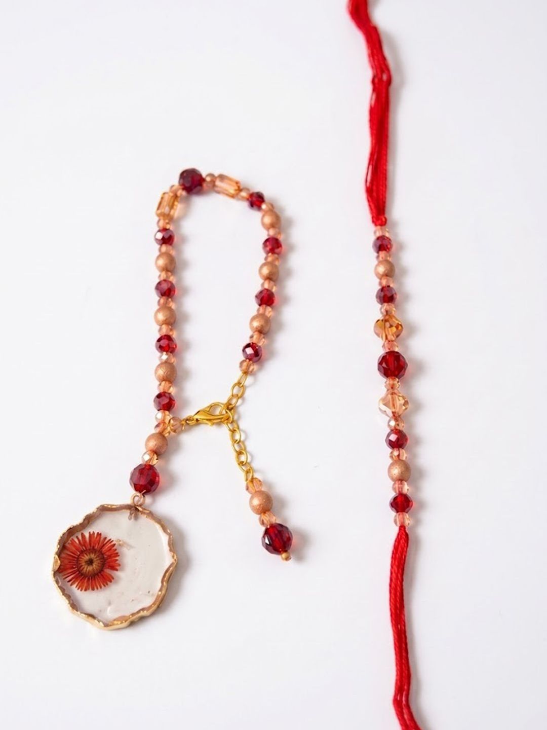 Dhiyona Set Of 2 Gold Toned Red Artificial Beads Bhaiya Bhabhi Rakhi