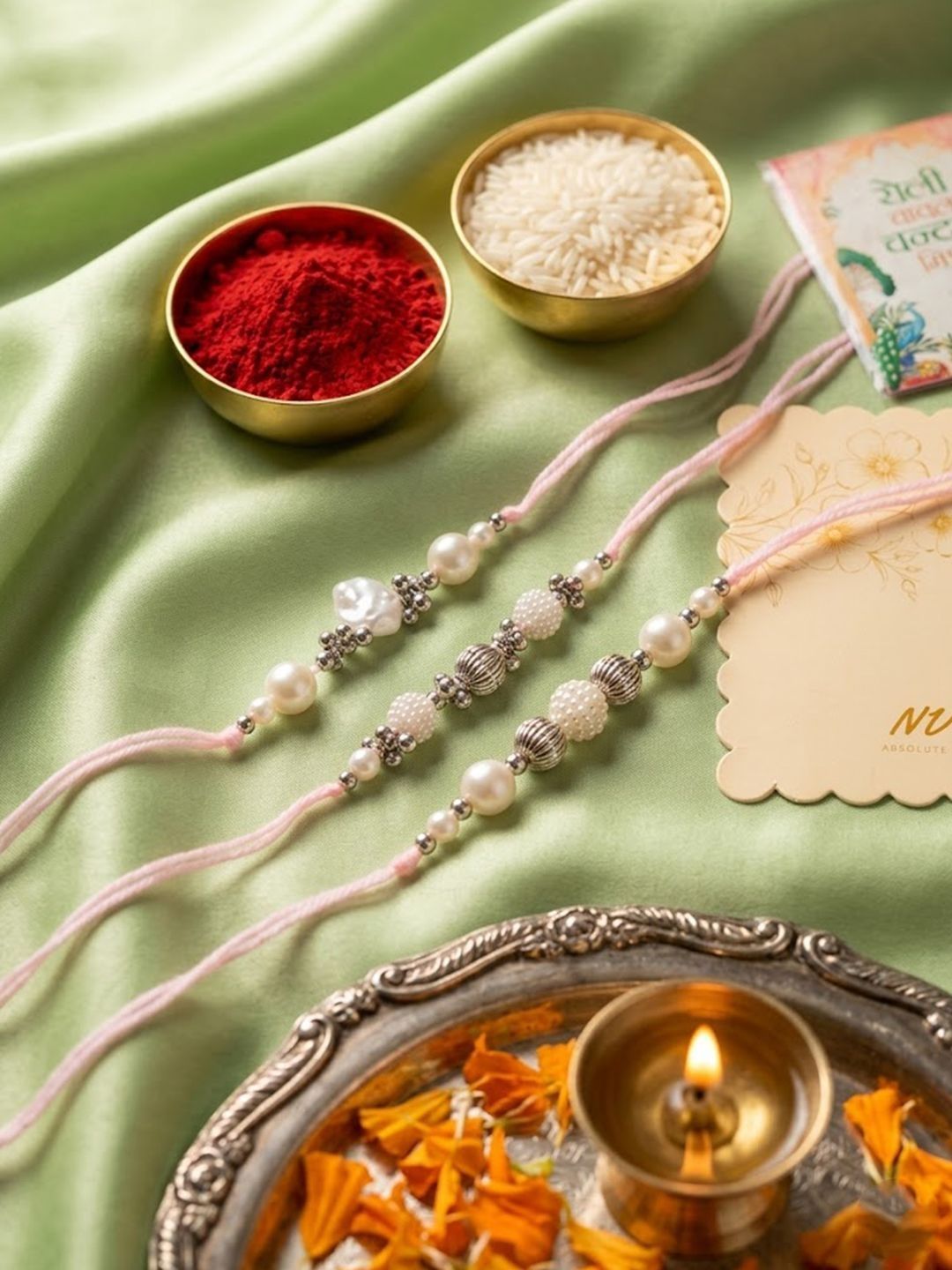 Dhiyona Set Of 3 White Pearls Thread Rakhi With Roli Chawal Chandan Mishri