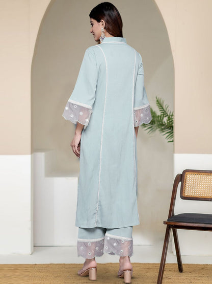 Turquoise Blue Women Solid Kurta with Trousers