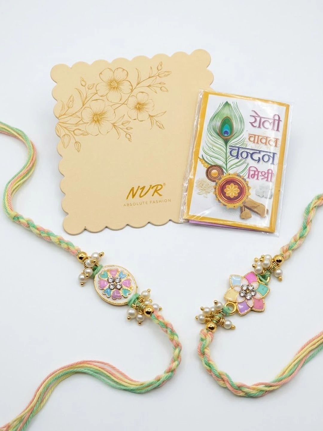 Dhiyona Set Of 2 Meenakari Floral Thread Rakhi With Roli Chawal Chandan Mishri