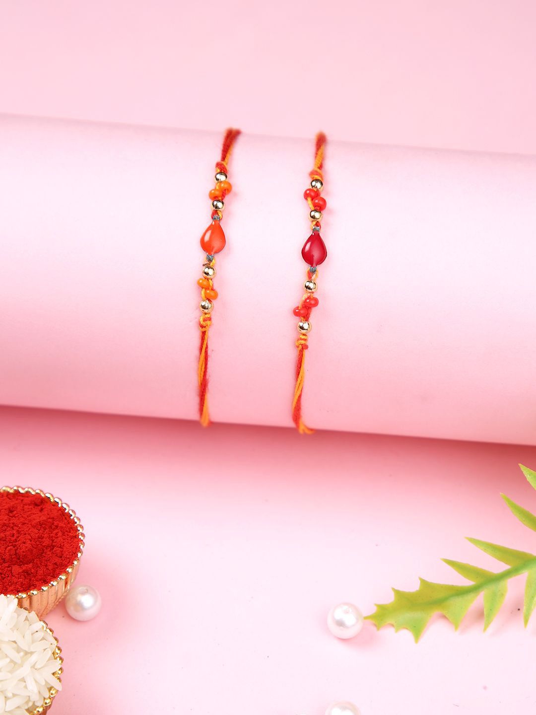 Dhiyona Orange Set Of 2 Beaded Thread Rakhis With Roli Chawal & Greeting Card