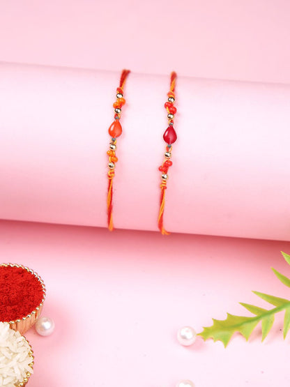 Dhiyona Orange Set Of 2 Beaded Thread Rakhis With Roli Chawal & Greeting Card
